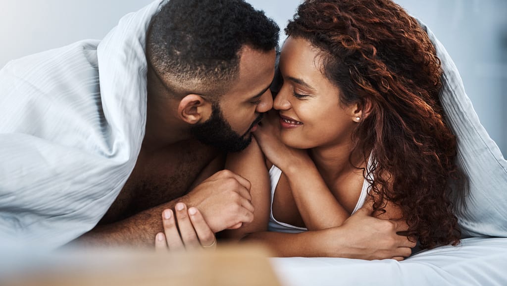 A couple embracing, highlighting physical intimacy.